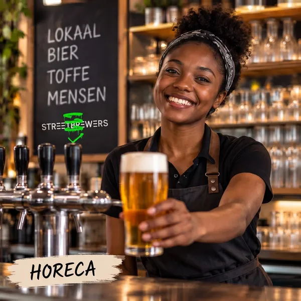 A smiling bartender holds out a fresh beer at the bar, under a Horeca label